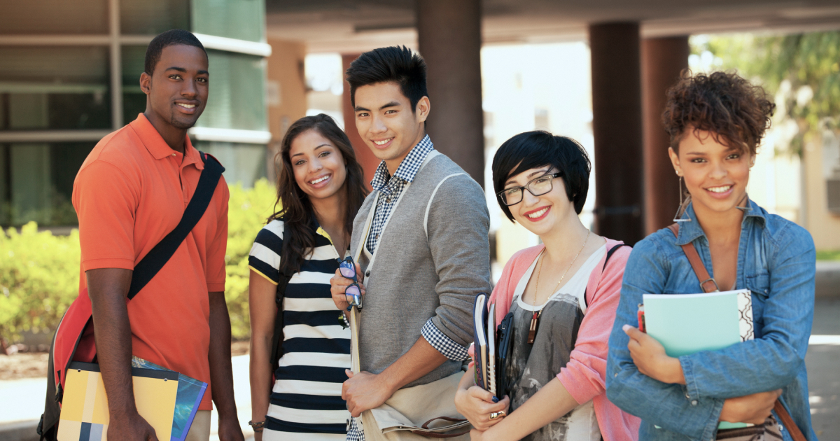 Future educators standing together on campus